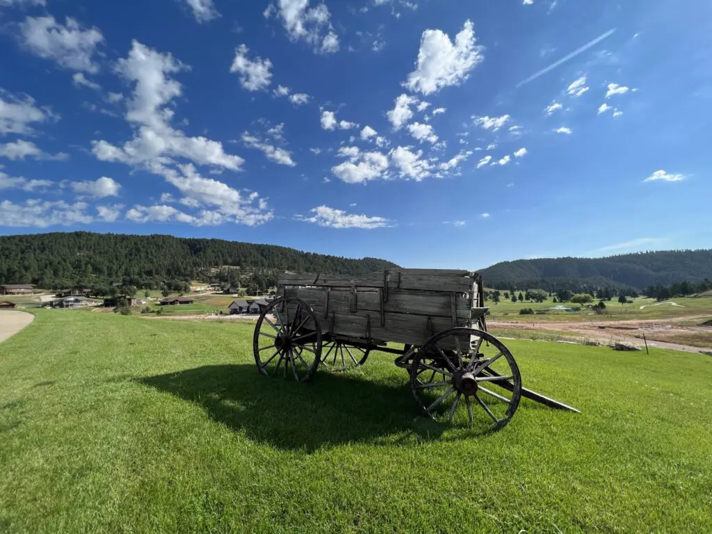 Old rustic wooden carriage set as neighborhood decoration